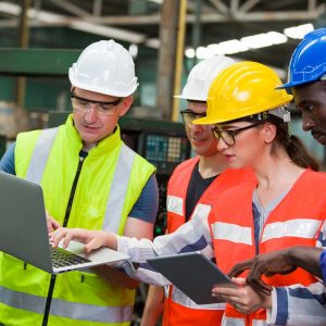 Diversity,Factory,Worker,Working,With,Computer,Laptop,In,Factory.,Male